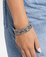Riding the Clutch - Silver Bracelet - Paparazzi Accessories