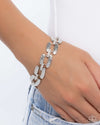 Demanding More - White Bracelet - Paparazzi Accessories