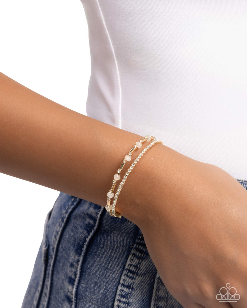 Publicity Pizzazz - Gold Bracelet - Paparazzi Accessories