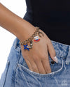 All-American Adornment - Gold Bracelet - Paparazzi Accessories