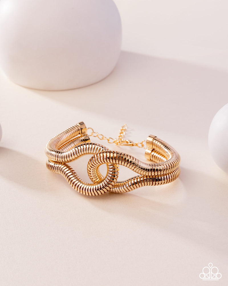 Interlocked Ignition - Gold Bracelet - Paparazzi Accessories