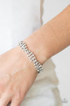 Twists and Turns - White Bracelet - Paparazzi Accessories
