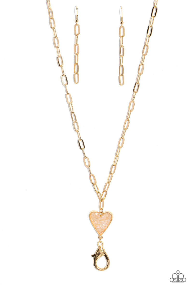 five-dollar-jewelry-kiss-and-shell-gold-lanyard-paparazzi-accessories