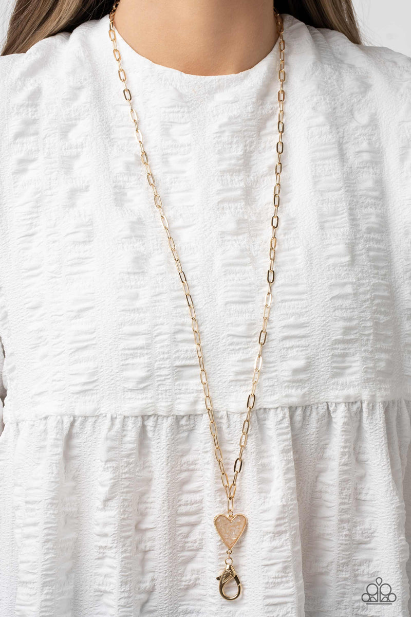 Kiss and SHELL - Gold Lanyard - Paparazzi Accessories